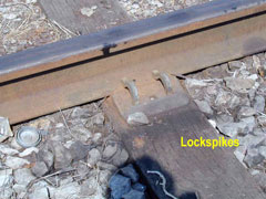 Lockspikes used with cast baseplate, 109lb rail dated 1958
